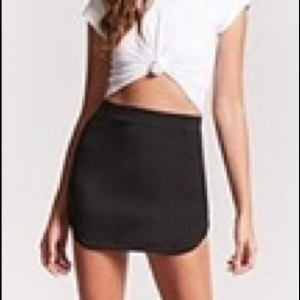 Black Dolphin Hem Mini Skirt